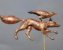 skulking fow and crow weathervane